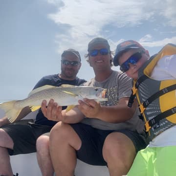 Group celebrating their haul