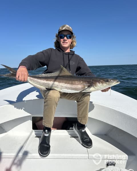 First Mate Mason assisting anglers