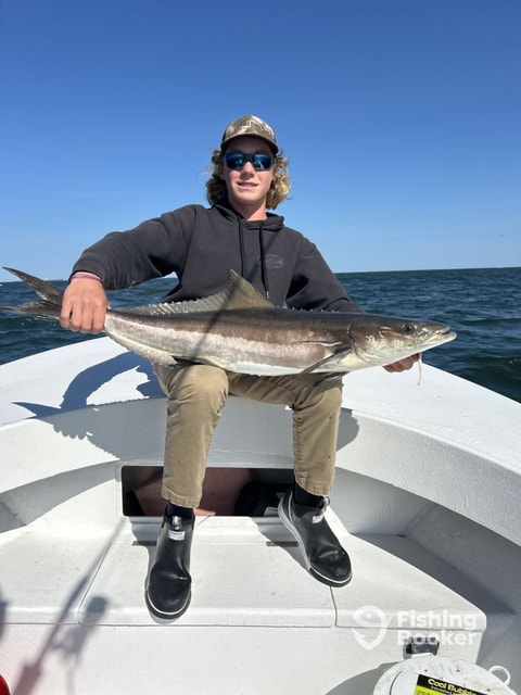 First Mate Mason assisting anglers
